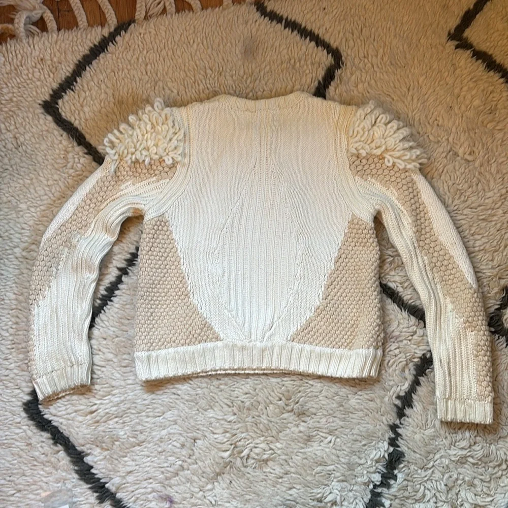 Elegant Cream Sweater with Textured Sleeves